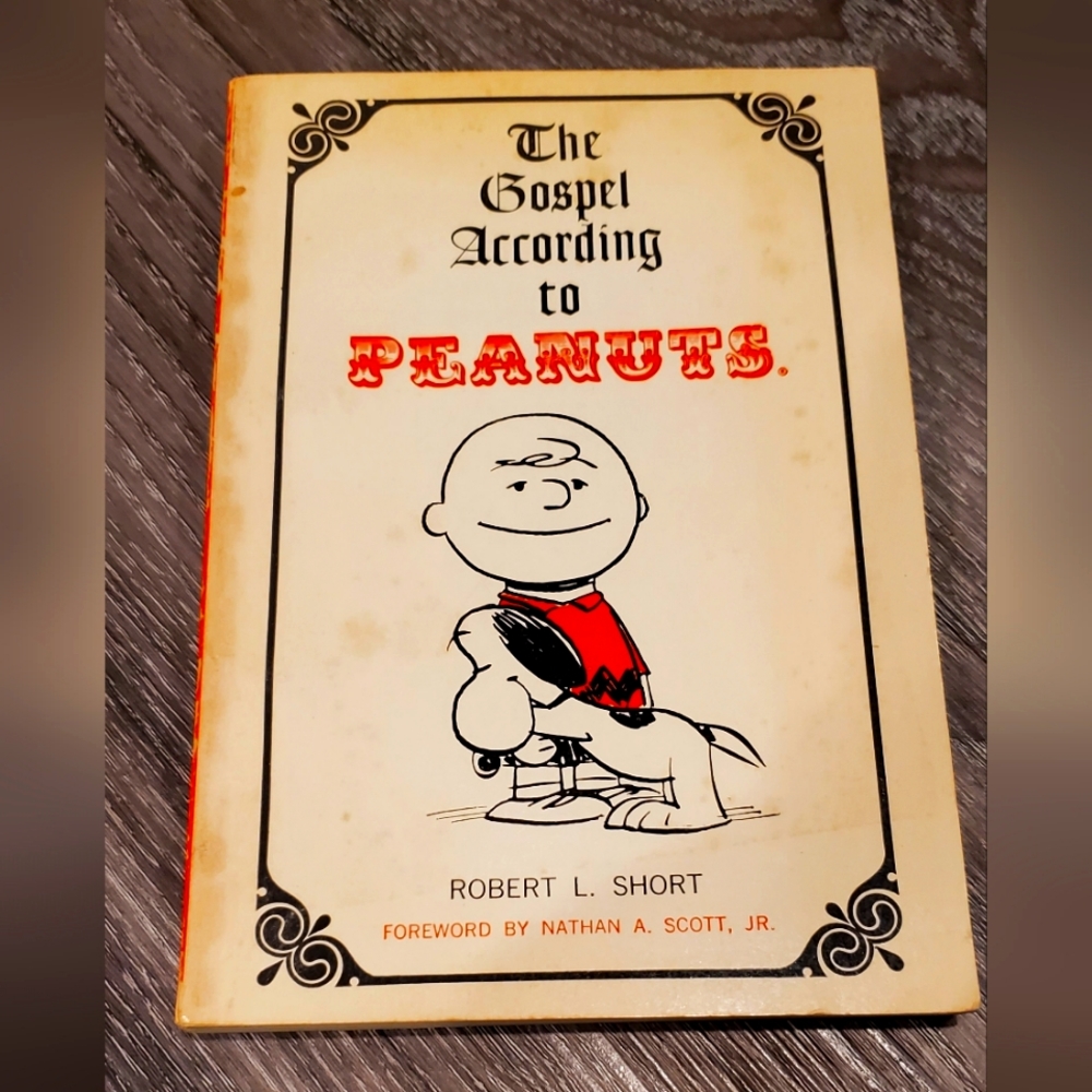 3/$40 vintage book - the gospel according to peanuts
